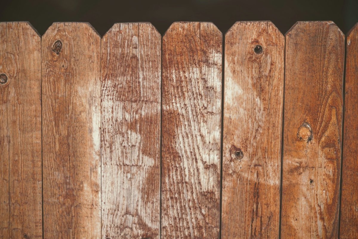 Stack of wood planks used for fence boards and rails